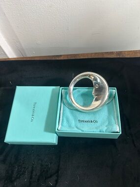 Tiffany & Co. Sterling Silver Moon Face Baby rattle with e graves name on it
